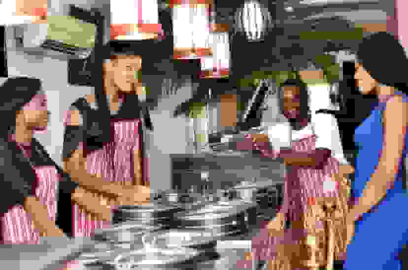 Group of caterers at an event, highlighting the importance of insurance coverage for part-time workers in small businesses like catering services